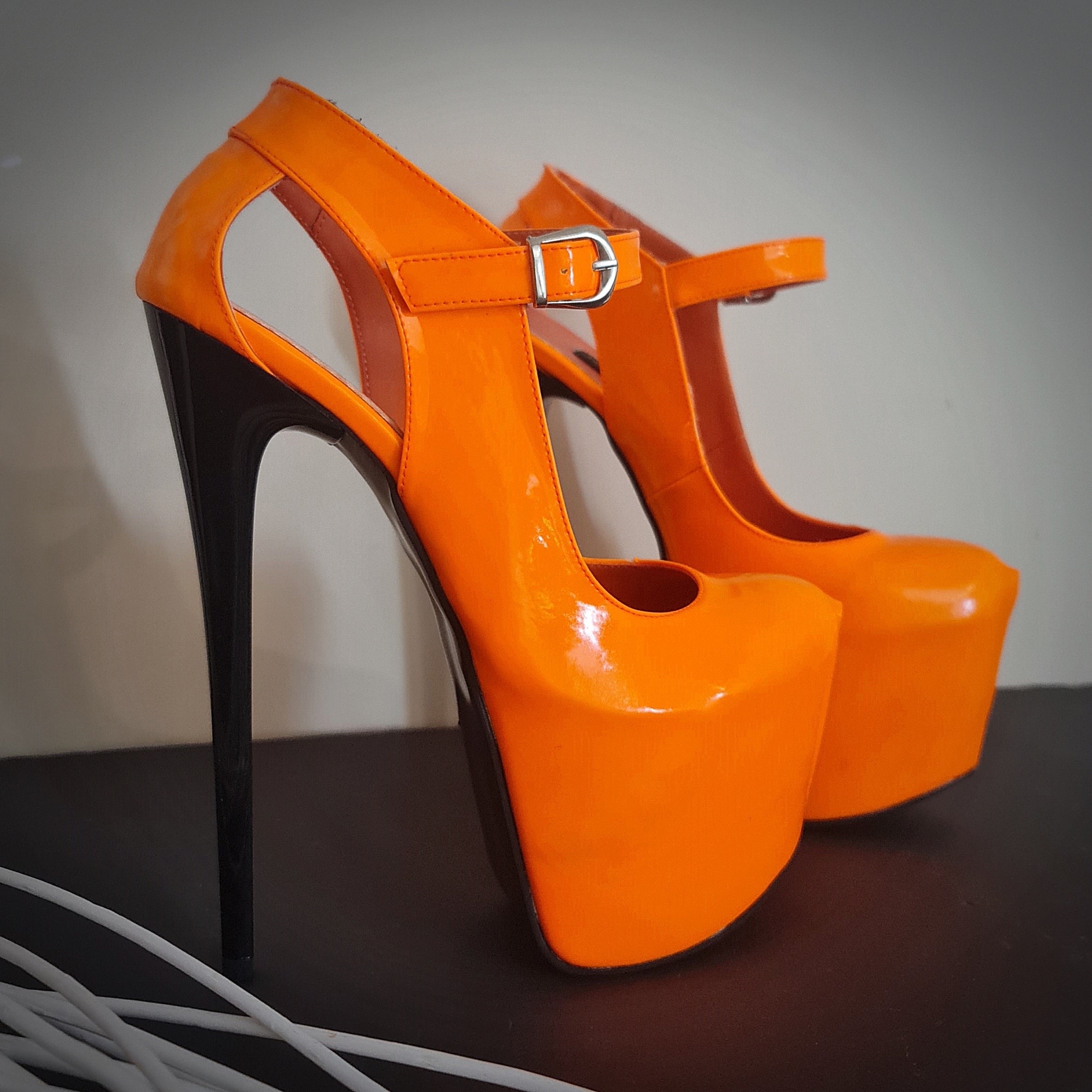 orange high heel shoes