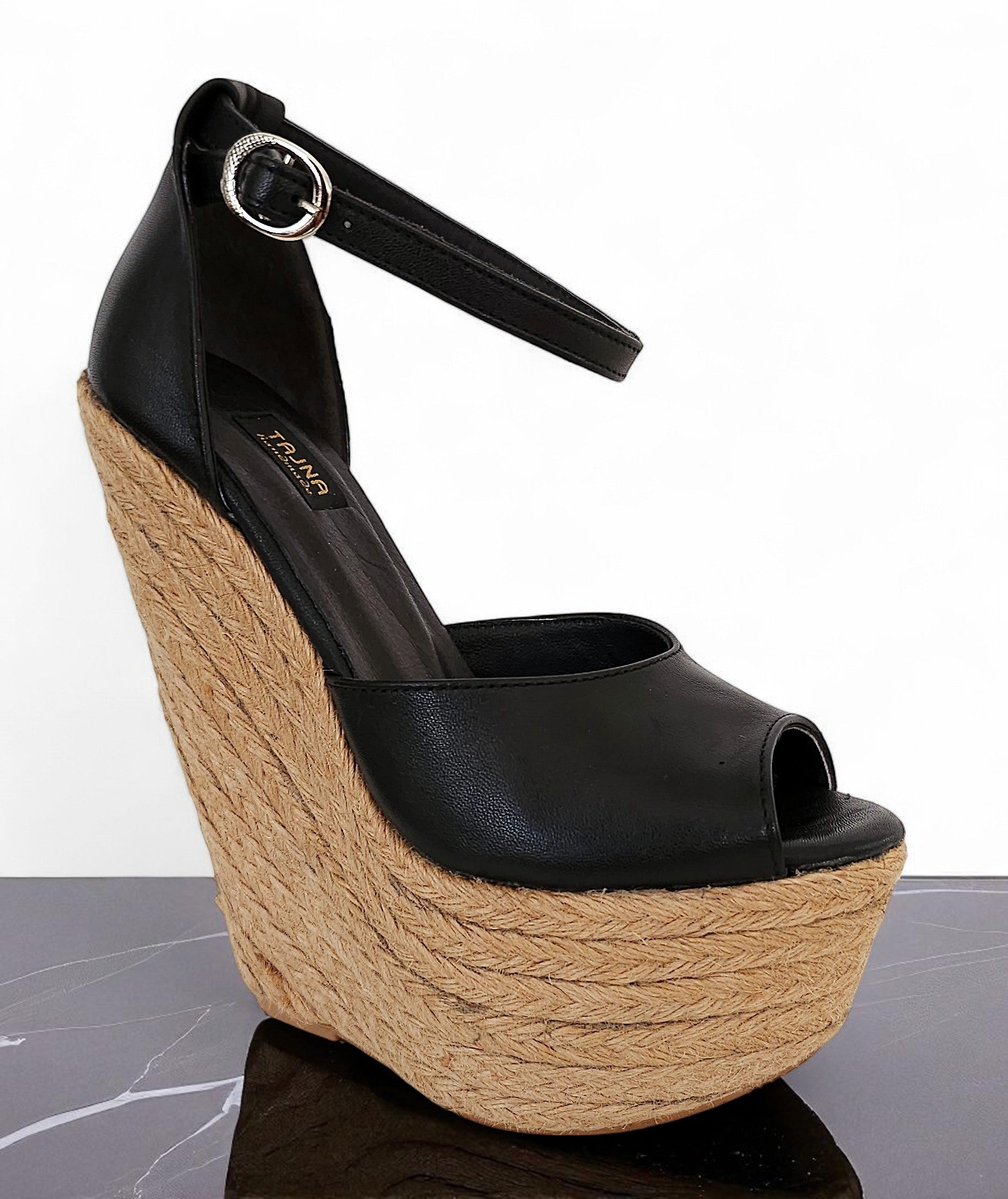 Black wedge sandal with jute sole on a white background