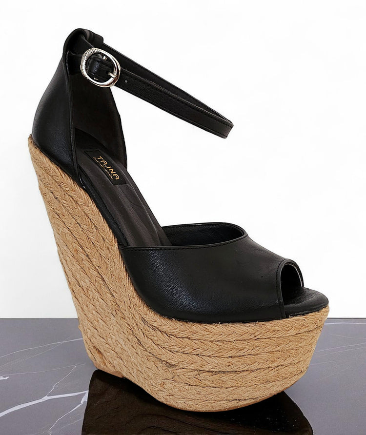 Black wedge sandal with jute sole on a white background