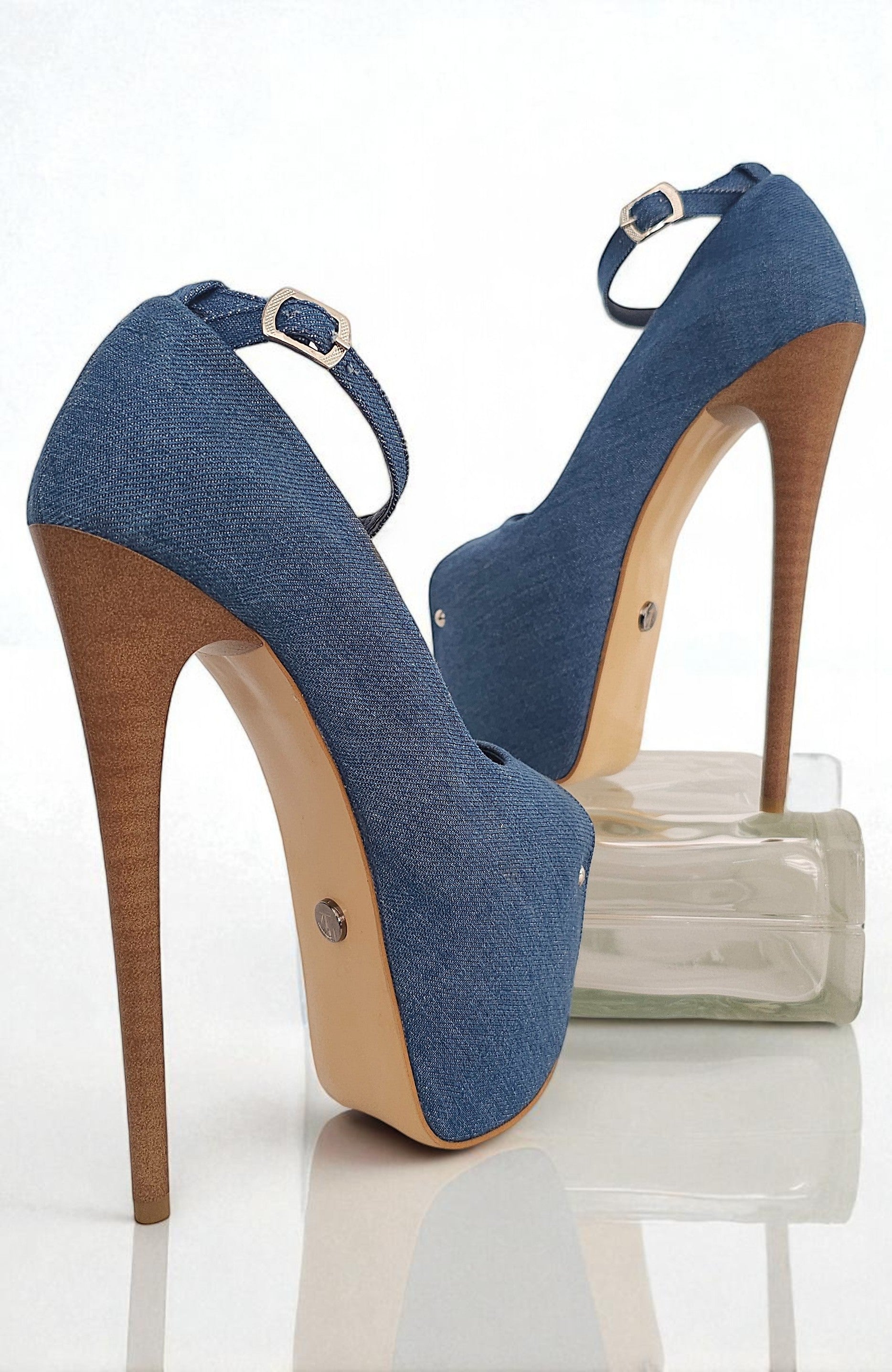 Blue high-heeled shoes with wooden soles on a white background